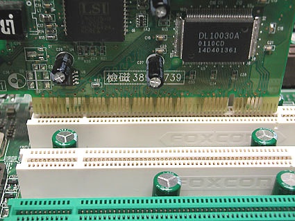 The PCI 2.1 specification currently supports 3.3V for bus voltage. The left slot notch prevents insertion of older 5 V cards (like those show here in the picture)